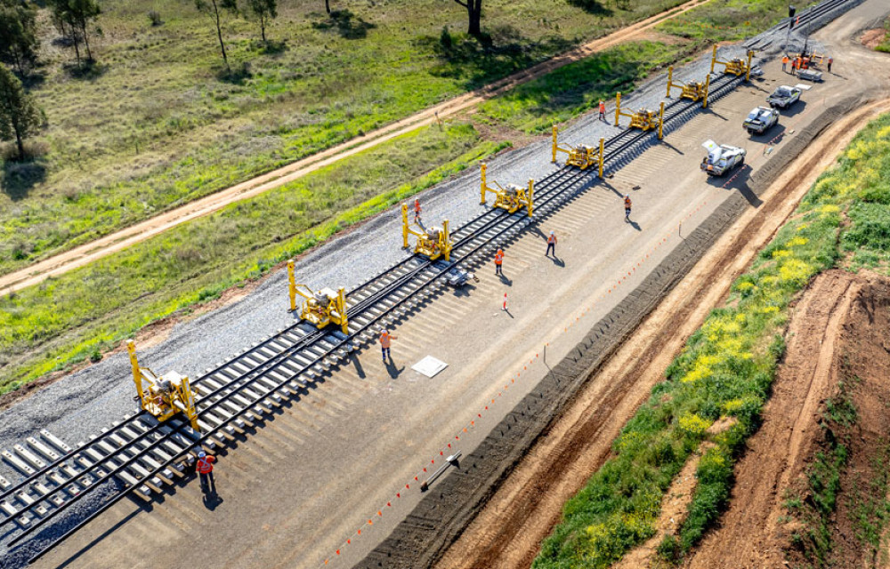 Work progresses on Victorian leg of $10b national rail project, including construction of railway stations, bridges, an underpass, and track loweringarticle image