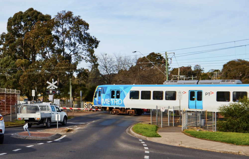 The project involves removing the Ruthven Street level crossing in Macleod by constructing a new elevated rail bridge and delivering associated rail, road, and public-realm upgrades.